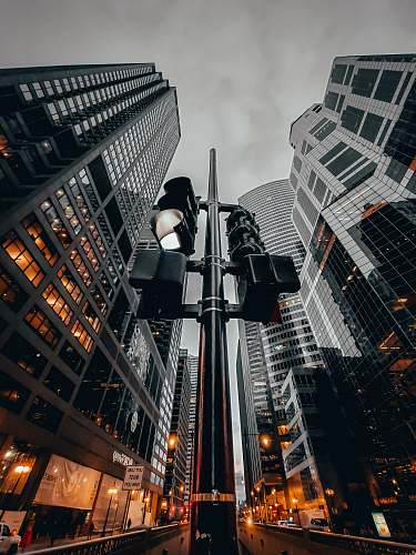 office building low-angle photography of glass walled high rise building urban